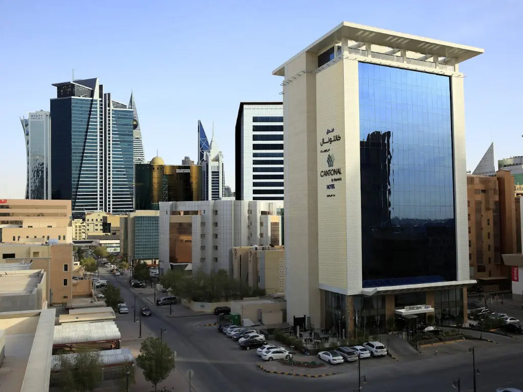 a wide angle long shot image of cantonal hotel building in riyadh