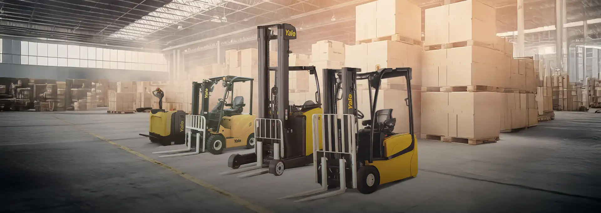 Full range of Yale warehouse equipment: electric forklift, reach truck, and pallet stacker for high-density storage in UAE by UMHE.